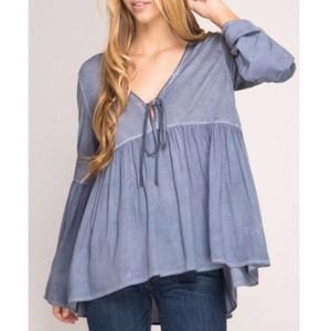 Bell Sleeves Enzyme Washed Blouse With Self Tie Detail.
